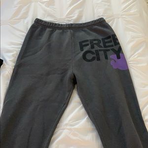 Grey Free City sweatpants with purple design